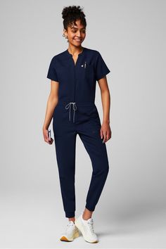 Empower Scrub Jumpsuit Fabletics Navy female Activewear >> Scrubs >> Jumpsuits MotionTech regular Scrub Jumpsuit, Unisex Activewear, Female Activewear, Grad Pic, Mandarin Collar, Active Wear For Women, Scrubs, Zip Ups, Jumper