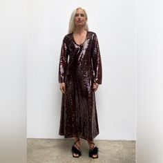 Long Dress With Round Neckline And Long Sleeves. Sequin Appliqu. Color Maroon | 2731/347 Outer Shell 100% Polyester Lining 100% Polyester No Measurements/ No In Real Life Photos Zara V-neck Sequin Dress, Sequin Maxi Dress For Fall, Fall Sequin Maxi Dress, Festive Fall Maxi Dress, Zara Long Sleeve Dresses For Party Season, Zara V-neck Dress For Party Season, Midi Length Festive Dresses For Party Season, Festive Midi Length Dress For Party Season, Festive Midi Dress For Party Season