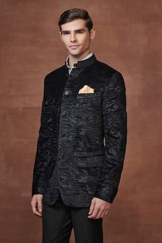 Black bandhgala in wool base with geometric textured pattern, piping on collar and flap pocket detail. - Aza Fashions Traditional Fitted Bandhgala For Winter, Traditional Fitted Bandhgala For Formal Occasions, Fitted Sherwani For Ceremonial Winter Occasions, Fitted Winter Sherwani For Ceremonial Occasions, Designer Bandhgala For Formal Winter Occasions, Designer Bandhgala For Winter Formal, Black Fitted Sherwani For Ceremonial Occasions, Formal Fitted Nehru Jacket For Transitional Season, Transitional Formal Fitted Nehru Jacket