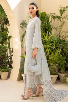 Brand: JAZMINProduct Code: IL-SS24-D2Collection: Iris by Jazmin Eid Lawn Unstitched Spring Summer CollectionFabric: Lawn DESIGN DETAILS: Digital Printed Embroidered Lawn Front Panel Digital Printed Embroidered Lawn Front Side Panels Embroidered Sleeves Borders Embroidered Front & Back Borders Digital Printed Embroidered Organza Dupatta Borders Embroidered Staple Dobby Net Dupatta Digital Printed Lawn Back & Sleeves Digital Printed Cambric Trouser DISCLAIMER:* Lining, Laces, and Tassels are not included in unstitched variants.* Embellishment items in stitched outfits are subject to market availability.* The actual colors of the outfit may vary from the colors being displayed on your device. CARE INSTRUCTIONS: Extra Fabric Has Been Used For Shoot Original Color May Vary Slightly From The Pic Elegant Anarkali Set With Floral Embroidery In Cambric, Elegant Cambric Anarkali Set With Floral Embroidery, Elegant Long Sleeve Salwar Kameez With Cutwork, Designer Semi-stitched Cutwork Sets, Semi-stitched Cutwork Sets For Eid, Elegant Unstitched Cutwork Kurta, Elegant Unstitched Kurta With Cutwork, Unstitched Elegant Kurta With Cutwork, Elegant Cutwork Dupatta For Eid