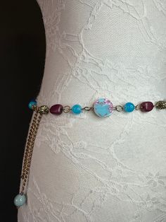 Beautiful handmade beaded belt with gorgeous beads.  Size 20"-30" can also be worn as a necklace.  Perfect for swimwear, resort wear, dresses & gifts.  Colour: Multi.  Select your waist size from the selection. We will add 12-14" extra chain to make the belt adjustable on the waist.  For further bespoke sizes, send me a convo.  Lovely accessory to complement dresses, tops, fit through jeans loops, swimwear, resort wear.  Unique ring design. Fan Design, Fan Fashion. Bohemian Beaded Waist Chain, Bohemian Waist Chain With Colorful Beads For Festivals, Bohemian Waist Chain With Round Beads, Bohemian Adjustable Chain Belt As A Gift, Bohemian Colorful Beads Waist Chain For Festivals, Multicolor Bohemian Waist Chain For Festivals, Bohemian Multicolor Waist Chain For Festival, Bohemian Waist Chain With Adjustable Round Beads, Bohemian Beaded Waist Chain As A Gift