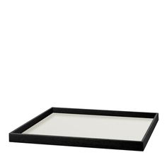 a black and white tray sitting on top of a table