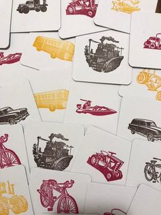 several coasters with different types of cars and trucks on them, all printed in red yellow and black