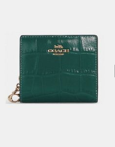 Coach Light Green leat her wallet with zip. Compact Coach Wallet As Gift, Coach Coin Purse With Zipper Closure As Gift, Coach Bifold Coin Purse Gift, Coach Bifold Wallet As Gift, Designer Green Wallet For Daily Use, Coach Green Wallet For Everyday Use, Green Coach Wallet For Everyday Use, Designer Green Wallet For Everyday Use, Designer Green Wallets For Gift