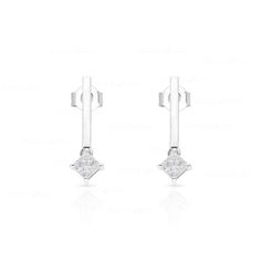 These sleek, modern bar earrings feature two princess-cut diamonds set in lustrous 10k gold. Perfect for the fashion-conscious, contemporary woman, they will be an eye-catching addition to any outfit. Modern Linear Earrings With Diamond Accents For Formal Events, Modern Linear Earrings With Diamond Accents For Formal Occasions, Modern White Linear Earrings For Formal Occasions, Modern Diamond Earrings With Tension Setting, Minimalist Formal Earrings With Tension Setting, Modern White Gold Linear Earrings For Formal Occasions, Modern Single Diamond Earrings For Formal Occasions, Modern Formal Earrings With Single Diamond, Modern Diamond White Single Earring