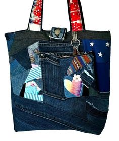 a handbag made out of jeans with patches and stars on the side, sitting in front of a white background