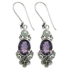 Luminous white pearls crown faceted amethysts that total 11 carats. Working in sterling silver Buana creates elegant earrings that celebrate Bali's floral splendor. 925 Sterling silver How To Wear Pearls, Pearl And Amethyst, Ribbon Jewelry, Pearl Dangle Earrings, Sterling Silver Dangle Earrings, Pearl Set, Pearl Earrings Dangle, Silver Earrings Dangle, Elegant Earrings