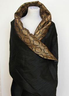 Our Beyond Luxury Wrap is truly couture. Two sided shawl made of 100% silk with a twist. A Go Kismet Original which I found in Italy and then reproduced as an affordable option. One side of the shawl is made of raw silk. Raw silk has a depth to it which most fabrics do not. Formidable and textured. Light is captured and plays off the natural threads. One size fits most.The reverse side of the shawl is made of silk damask. Each panel has been woven with gold or silver threads creating an engineer Luxury Shawl, Gold Shawl, Ladies Caftan, Crisp White Blouse, Short Tunic, Silk Shawl, Pashmina Shawl, Wedding Christmas, Different Outfits