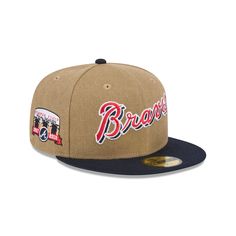 the atlanta braves'new era 59fifty cap is shown in tan and navy