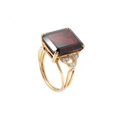 This is part of Chairish’s Fine Jewelry assortment.  Garnet Diamond Cocktail Ring in 14K Gold featuring natural garnet of 10.7 carats and diamonds of 0.1 carats. The gorgeous handcrafted ring goes with every style. Garnet helps with love and relationships because its red color symbolizes a strong love or romantic connection.  Designed with octagon cut garnet as center stone with diamonds studded on side making a beautiful design that makes it a perfect fit to wear it on your wedding or style it Romantic Connection, Love And Relationships, Diamond Cocktail Ring, Diamond Cocktail Rings, Strong Love, Garnet Ring, Handcrafted Rings, Garnet Rings, Ring Size 7