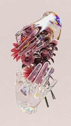 a glass vase filled with lots of flowers