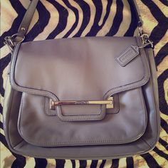 Beautiful, Never Used, Putty Grey Leather With Champagne Lining. Comes With One Short And One Longer Adjustable Strap. Bag Is Approximately 12" Long, 8" High, 3"Deep Elegant Flap Satchel With Silver-tone Hardware, Elegant Satchel With Silver-tone Hardware And Flap, Everyday Flap Bags With Silver-tone Hardware, Everyday Bags With Silver-tone Hardware And Flap, Chic Coach Flap Bag For Travel, Chic Coach Satchel With Silver-tone Hardware, Flap Bags With Silver-tone Hardware For Everyday Use, Coach Crossbody Satchel With Silver-tone Hardware, Coach Taylor