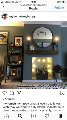 a living room filled with furniture and a fire place next to a wall mounted mirror