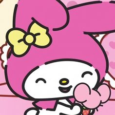 an image of a hello kitty holding a heart