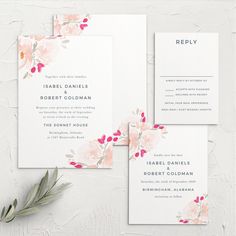 wedding stationery with pink flowers and greenery on the front, white paper in the back