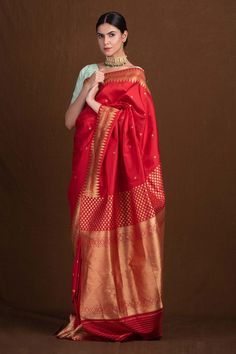 Red banarasi saree with floral woven pattern and geometric border.
Component: 1
Pattern: Handwoven
Type Of Work: Floral
Fabric: Pure Katan Silk
Color: Red
Other Details: 
Weight (in gms) approx. : 900
Note: Blouse worn by the model is not for sale
Occasion: Wedding - Aza Fashions Red Banarasi Saree, Banarasi Katan Silk Saree, Katan Silk Saree, Katan Silk, Banarasi Saree, Blouse For Women, Woven Pattern, Fashion App, Wedding Time