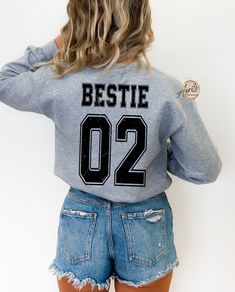 Custom Bestie Sweatshirt, Bestie 01-02 Hoodie, Besties Matching Shirt, Best Friends Sweatshirt, Besties Hoodie, Best Friend Matching Gift  Price is for per item. This item is just for a shirt, not a set. Shirts are sold separately. Please, add as many as you need to your cart  CAUTION: For security reasons, there is no rope in the throat area for youth hoodie. Hello!! We wish everyone to smile with our cute, stylish, and trendy graphic sweatshirts and hoodies. We assure you these sweatshirts and Winter Fan Merchandise Sweatshirt With Letter Print, Fall Fan Merchandise Hoodie Sweatshirt, Fan Merchandise Fall Hoodie Sweatshirt, Hooded Tops With Letter Print For Fan Merchandise, Hooded Tops With Letter Print For Fans, College Fan Apparel Crew Hoodie, College Crew Hoodie In Fan Apparel Style, College Crew Neck Fan Apparel Hoodie, Winter Crew Hoodie Pre-shrunk