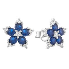 Presenting our Sapphire Blossom Floral Stud Earrings, a splendid tribute to timeless beauty and nature's elegance. Delicately crafted in sterling silver, these stud earrings feature synthetic blue spinel and cubic zirconia, arranged in a charming floral motif. The stones' sapphire-like hue coupled with the sparkling cubic zirconia creates a vibrant, captivating look. Encased in a stylish gift box, these earrings from Contessa Di Capri make a perfect gift for a loved one or a delightful treat for oneself. Blue Spinel, Floral Studs, Stylish Gifts, Floral Motif, Timeless Beauty, Cubic Zirconia, Capri, Blossom, Sapphire