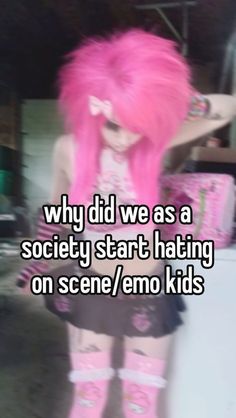 a girl with pink hair standing in front of a white wall and text that reads why did we as a society start hating on scene / emo kids?