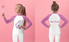 Protect the little ones from the elements with this colorful kids rash guard. Its sun-protective fabric and long body and sleeves make it perfect for running around on the beach, or just being active indoors.  * 82% polyester, 18% spandex * 38-40 UPF * Fitted design * Very soft four-way stretch fabric that stretches and recovers on the cross and lengthwise grains * Comfortable longer body and sleeves * Overlock, flatseam and coverstitch * Blank product components sourced from China Playful Long Sleeve Rash Guard Upf 50+, Long Sleeve Swimwear With Upf 50+ For Play, Playful Long Sleeve Rash Guard For The Beach, Playful Long Sleeve Rash Guard For Beach, Playful Long Sleeve Rash Guard With Uv Protection, Long Sleeve Rash Guard For Summer Playwear, Playful White Rash Guard With Uv Protection, Playful Long Sleeve Swimwear With Uv Protection, Long Sleeve Rash Guard With Uv Protection For Playwear