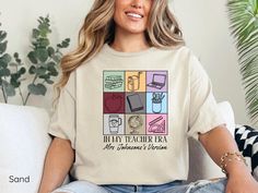 a woman sitting on a couch wearing a t - shirt that says, library teacher's librarian