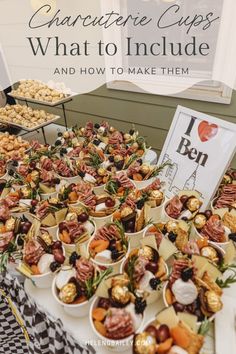 a table filled with lots of different types of desserts and pastries on it