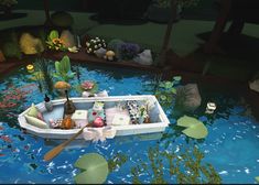 a boat floating on top of a body of water surrounded by plants and rocks with candles