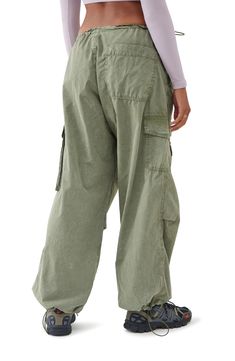 Bungee cords at the waist and cuffs let you adjust the fit of roomy cotton cargo joggers equipped with a mix of utility pockets. Exclusive retailer 30 1/2" inseam; 20" leg opening; 9 1/2" front rise; 15 1/2" back rise (size Medium) 100% cotton Machine wash, line dry Made in Turkey Climbing Pants Women, Hiking Vibes, Granola Style, Climbing Pants, Jeans Outfit Women, Bungee Cords, Bdg Urban Outfitters, Utility Pockets, Fire Fits