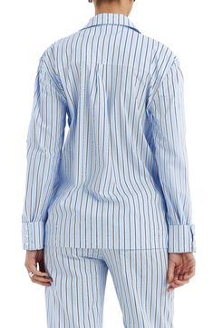 A lightweight cotton-blend design lends versatile style to this boxy-fit button-up covered in smart stripes. Front button closure Spread collar Long sleeves with button cuffs 70% cotton, 27% polyamide, 3% elastane Dry clean Imported Blue Cotton Shirt With Striped Cuffs, Striped Cotton Blouse With Button Cuffs, Casual Pinstripe Tops With Button Cuffs, Striped Button-up Tops For Loungewear, Pinstripe Tops With Button Closure And Relaxed Fit, Striped Tops With Button Cuffs And Relaxed Fit, Pinstripe Cotton Button-up Blouse, Striped Blouse With Button Cuffs And Relaxed Fit, Cotton Shirt With Striped Cuffs And Relaxed Fit