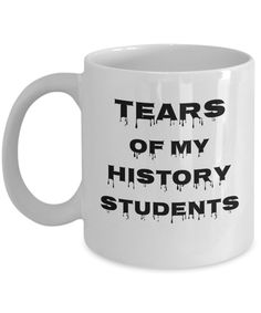 a white coffee mug that says tears of my history students