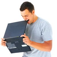 a man is holding a laptop open and yawning with his mouth wide open