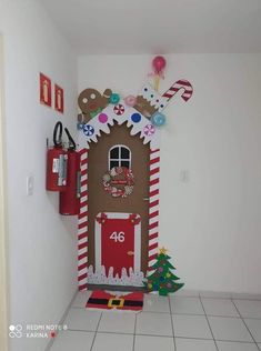 a door decorated with gingerbreads and candy canes