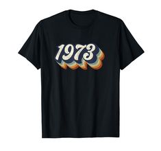 PRICES MAY VARY. Unique trendy gift for someone born in 1973 turning 47 this year. Perfect cool t-shirt Christmas present for toddler 2t 3t 4t, youth boys girls, kids teens. Great last minute graphic tee shirt for friend husband or wife. Made in 1973 Awesome Retrodesign for grandpa or grandma who love classic seventies disco vibes. Great for a hippie throwback 60s 70s 80s decades costume party. Faded tan blue muted colors for men and women. Mothers Day Fathers Day for mom and dad. Lightweight, C Retro Short Sleeve T-shirt For Birthday, Christmas Presents For Toddlers, Decades Costumes, Groovy Tees, Disco Vibes, 47th Birthday, Vintage 1973, Vintage Birthday, Graphic Tee Shirt