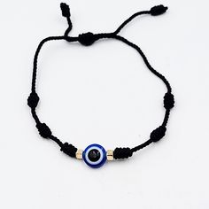 Throughout the whole human history, in every culture and religion, the eye figure has been considered as a powerful talisman to defy evil forces. One of the most popular amulets is the blue glass eye charm. The evil eye is a curse or legend believed to be cast by a malevolent glare usually catching a person unaware. You can wear an evil eye bracelet or lucky eye necklace to save yourself from negative energies, such as anger, hatred, fear, jealousy and other such evil energies that can affect yo Black String Bracelet, Eye Rings, Evil Eyes, Evil Eye Ring, Human History, Knot Bracelet, Worry Stones, Eye Ring, Eye Bracelet