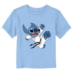 Ohana means family, and family means no tee gets left behind! Find the perfect style for your little one with this officially licensed Toddlers' Disney Lilo & Stitch Karate Alien Graphic T-Shirt! This fun design features the lovable Stitch wearing his Karate outfit and black belt while performing a front kick across the front. Celebrate a certain alien, otherwise known as Experiment 626 with new fabulous apparel from the incredible movie! Character Style Cotton Short Sleeve Tops, Themed Blue Tops For Fan Merchandise, Blue Themed Fan Merchandise Tops, Character Crew Neck Cotton Top, Character Graphic Print Short Sleeve Tops, Blue Short Sleeve Themed Tops, Blue Cartoon Print T-shirt For Disney Fan Events, Themed Blue T-shirt For Fan Merchandise, Short Sleeve T-shirt With Character Print