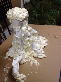 a cake made to look like a woman's dress