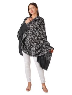 Indulge in the luxurious warmth and timeless elegance of our Cozy Black Pashmina Shawl, delicately adorned with elegant white embroidery. Crafted from premium pashmina, this shawl offers unparalleled softness and comfort, perfect for adding a touch of sophistication to any outfit. Product Details: Hand Embroidered Kashmiri Pashmina Shawl Material: Pure Pashmina (100% Cashmere) Size: 100 cm X 203 cm / 40 Inch X 80 Inch / 1.1 x 2.2 Yards (Approx) Color: Black Embroidery: Intricate white embroidery Luxury Black Embroidered Pashmina Shawl, Kashmiri Pashmina Shawl, Black Pashmina, Black Embroidery, Wool Wrap, Pashmina Shawl, White Embroidery, Cashmere Scarf, Timeless Beauty