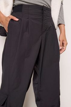 Made to go from workout to weekend plans, the Mesmerize Me Pant from FP Movement features a relaxed fit and lightweight fabrication with oversized pockets and a wide, ribbed knit waistband. Athleisure Wide-leg Parachute Pants With Pockets, Functional Fall Bottoms With Elastic Waistband, Fall Bottoms With Elastic Waistband, Black Wide Leg Bottoms With Functional Pockets, Athleisure Bottoms With Cargo Pockets And Relaxed Fit, Relaxed Fit Athleisure Bottoms With Cargo Pockets, Athleisure Parachute Pants With Side Pockets And Loose Fit, Relaxed Fit Bottoms With Functional Pockets For Work, Wide Leg Work Bottoms With Functional Pockets