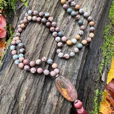 This mala is made with high-quality Sonora and Red Creek Jasper gemstones which bring connection and tranquility to the wearer. Zodiac Signs: Aries and Scorpio Chakras: Root and Sacral Sonora Jasper is a very grounding stone and connects you to the Earth's energy, and is known as the “supreme nurturer.” It sustains and supports during times of stress, bringing a sense of tranquility and wholeness. This stone unifies all aspects of your life. Jasper helps to calm the mind and works in the emotion Spiritual Stone Beaded Necklaces For Meditation, Spiritual Jasper Jewelry For Meditation, Nature-inspired Gemstone Beads Necklace For Meditation, Nature-inspired Gemstone Beads Jewelry For Meditation, Spiritual Beaded Necklaces For Meditation, Multicolor Gemstone Necklace For Meditation, Nature-inspired Agate Jewelry For Meditation, Nature-inspired Gemstone Beaded Necklace For Wellness, Bohemian Necklaces With Stones For Meditation