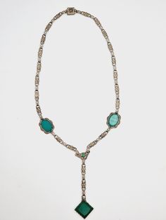 Antique Art Deco Chrydoprase Glass Silver Tone Necklace Circa 1930's. A lovely Art Deco necklace featuring chrysoprase glass stones set with embossed silver tone metal links. The necklace closes with a decorative secure box clasp. In really good condition. The length of the necklace is 44 cm and the pendant drop is 7.5 cm. Please study the pictures carefully as they do form part of the description. Please feel free to contact me with any questions. As will all vintage/antique jewellery items, pl Art Deco Necklace, Box Clasp, Vintage Necklaces, Antique Art Deco, Antique Jewellery, Antique Art, Stone Settings, Vintage Necklace, Vintage Antiques