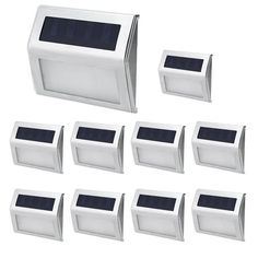 eight white solar powered motion sensor lights