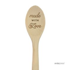 a wooden spoon with the words made with love on it