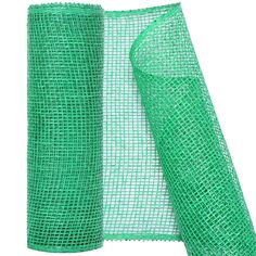 green wire mesh is shown on top of the white background and next to it's roll