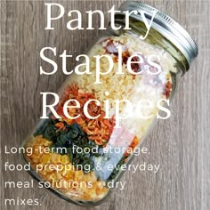 a jar filled with food sitting on top of a wooden table