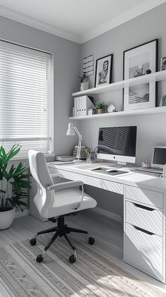 a white desk and chair in a room