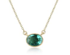 Introducing a captivating solitaire emerald necklace, adorned with a breathtaking 1.30-carat oval cut emerald. Set horizontally in a thin bezel setting, the emerald showcases a medium green color, with semi-transparent clarity and a delightful play of luster. Crafted in luxurious 14k gold, the necklace features a dainty cable chain that can be effortlessly adjusted from 18 to 16 inches in length, ensuring a perfect fit and adding a touch of versatility to this elegant piece. Setting Style: Bezel May Emerald, Emerald Set, Emerald Style, Halo Necklace, Solitaire Necklaces, Emerald Necklace, Modern Necklaces, Emerald Earrings, Emerald Stone