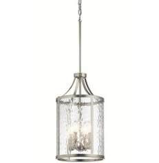 a small light fixture hanging from the ceiling with clear glass and metal fixtures on it