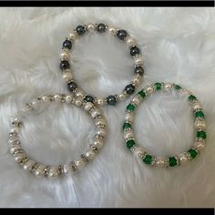 Mix & Match Fwc Pearl Stretch Bracelets, Black, White Or Green Beads Choose From Three Colors All White Fwc Pearl Black And White Fwc Pearls White Fwc Pearls With Green Acrylic Beads Each Order Is For 3 Bracelet. Black And White Bracelets Beads, Winter Beaded Bracelets, Green Bracelet Aesthetic, White Bracelet Beads, Green Bracelet Ideas, Bracelet Inspo Beads, Pulseras Aesthetic, Silver Knot Bracelet, Silver Wrap Bracelet