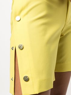 Lime green cotton side-button tailored shorts from MONSE featuring side button fastening, belt loops, concealed front fastening and straight leg. | Monse Side-Button Tailored Shorts Chic Yellow Shorts For Workwear, Yellow Short Length Workwear Bottoms, Yellow Short Bottoms For Work, Yellow Short Length Bottoms For Workwear, Yellow Workwear Bottoms Shorts, Green Workwear Shorts With Belt Loops, Spring Green Buttoned Shorts, Summer Shorts With Button Cuffs, Spring Green Shorts With Buttons