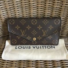 Gently Used Authentic. Measurements 7.5lx1”Wx4.25 H Elegant Formal Wallets With Logo, Elegant Everyday Wallets With Logo, Elegant Wallets With Logo, Elegant Travel Wallet With Logo, Classic Formal Monogram Wallet, Elegant Monogram Wallet For Formal Occasions, White Gold Diamond Band, Louis Vuitton Felicie, Mk Wallet